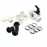 Doheny's Solar Dome Bypass Kit, featuring various components laid out, including white PVC pipe fittings (T-connector, couplings), a white three-way diverter valve with a black handle, black threaded elbows, and metal hose clamps.